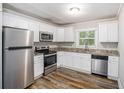 Kitchen with stainless steel appliances, and granite countertops at 2721 Glenvalley Dr, Decatur, GA 30032