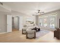 Inviting living room with access to a balcony and an open floor plan leading to the other rooms at 390 17Th Nw St # 2005, Atlanta, GA 30363