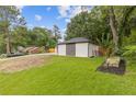 View of the well-maintained backyard showcasing lush greenery and landscaping at 1272 Sherwood Dr, Norcross, GA 30093