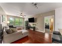 Living room with natural light from large windows and a view into the connected main bedroom at 898 Oak Sw St # 1301, Atlanta, GA 30310