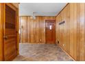 Inviting entryway with unique tile flooring and a classic wood front door at 501 Samaritan Dr, Cumming, GA 30040