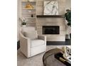 Cozy sitting area with a fireplace, built-in shelving, and stylish decor at 345 Glen Iris Ne Dr # 5, Atlanta, GA 30312