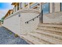 Brick staircase leading up to townhome entrance, framed by landscaping at 190 Rolison Way, Fayetteville, GA 30214