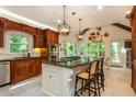 Beautiful kitchen with a large island, granite countertops, and stainless steel appliances at 210 Hunters Vw, Roswell, GA 30075