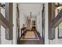 Inviting entryway with staircase and view of the wine cellar at 18 Peachtree Ne Ave # 5, Atlanta, GA 30305