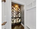Elegant wine cellar with diamond-patterned shelving and ambient lighting at 18 Peachtree Ne Ave # 5, Atlanta, GA 30305
