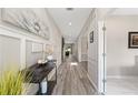 Elegant hallway featuring modern decor, stylish lighting, and pristine walls for a sophisticated ambiance at 3962 Roberts Crest Dr, Suwanee, GA 30024
