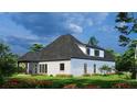 Beautiful white brick home with a covered back porch and well-manicured landscaping at 1077 Crooked Creek Rd, Lithonia, GA 30058