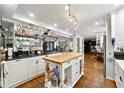 Spacious kitchen with an island, modern appliances, sleek countertops and custom cabinetry at 1438 Salem Dr, Alpharetta, GA 30009