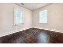 Cozy bedroom features multiple windows, offering ample natural light and outside views at 1914 North Nw Ave, Atlanta, GA 30318