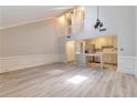 Spacious living room featuring vaulted ceilings, hardwood floors, and an open layout at 440 Forestgate Ct, Atlanta, GA 30350