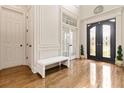 Bright foyer with hardwood floors, and gorgeous front door at 2230 Cambridge Hill Ct, Dacula, GA 30019