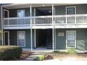 Exterior view of building 7 with white railings, stairs, and the building number at 2697 Vinings Central Dr # 61, Atlanta, GA 30339