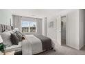 Cozy bedroom with a comfortable bed, natural light, and closet at 2810 Georgia Aster Nw Way # 6, Atlanta, GA 30318