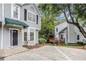 Well-maintained townhome with a private entrance, mature trees, and a serene outdoor space at 4098 Charlotte Se Ct, Smyrna, GA 30082