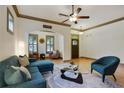 Bright living room boasts hardwood floors, large windows, and modern decor for comfortable living at 2822 Prado Ln, Marietta, GA 30066