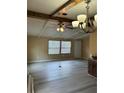 Spacious living room with wood-look floors and a large ceiling fan at 1631 Billy Bullock Rd, Dallas, GA 30157