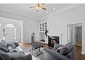 Spacious living room with a fireplace, hardwood floors, and ample natural light at 4021 Melvin Sw Dr, Atlanta, GA 30331