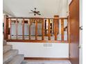 Inviting entryway showcasing the carpeted staircase and a glimpse into the living room at 1159 Midland Nw Dr, Acworth, GA 30102