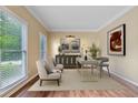 Comfortable office with a neutral color palette, modern decor and lots of light at 3355 Golfe Links Dr, Snellville, GA 30039