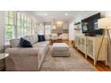 Bright living room featuring hardwood floors and a comfortable seating arrangement at 2163 Medfield Ne Trl, Chamblee, GA 30345