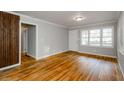 Sunlit living room with polished hardwood floors and fresh neutral paint at 2895 Akron St, Atlanta, GA 30344