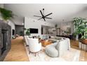 Large open-plan living room with modern furnishings and an open design concept leading into the kitchen at 845 Spring Nw St # Ph4, Atlanta, GA 30308