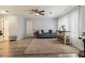 Spacious living room filled with natural light, featuring stylish flooring and a comfortable atmosphere at 4706 Cedar Park Trl, Stone Mountain, GA 30083
