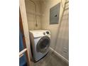 Modern laundry area with a new white Samsung washing machine at 395 Central Park Ne Pl # 610, Atlanta, GA 30312