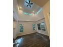 Bright living room with high ceilings, clerestory windows and hardwood floors at 101 Dancing Fox Rd, Decatur, GA 30032