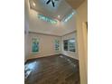 Bright living room with high ceilings, clerestory windows and hardwood floors at 101 Dancing Fox Rd, Decatur, GA 30032