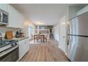 Modern kitchen with stainless steel appliances and granite countertops perfect for cooking and entertaining at 446 Jaywood Dr, Stone Mountain, GA 30083