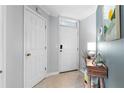 Entryway features tile flooring, storage closet, and entry door at 719 Mcgill Park Ne Ave, Atlanta, GA 30312