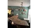 Stylish bar area featuring a tiled countertop with shelving for glassware and drinks at 1793 Cutters Mill Way, Lithonia, GA 30058