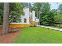 Beautiful home with well-kept lawn and attractive landscaping in a private, wooded location at 2189 Spear Point Dr, Marietta, GA 30062