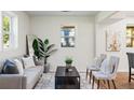 Bright living room with stylish decor, neutral tones, and hardwood floors at 1270 Graymont Sw Dr, Atlanta, GA 30310