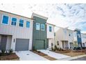 Row of newly constructed townhouses with modern design and curb appeal at 1648 Florence Nw Run, Atlanta, GA 30318