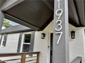 Close-up of the house number 