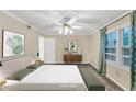 Serene main bedroom with a plush bed, soft lighting, and ample closet space at 58 Monet Nw Ct, Atlanta, GA 30327