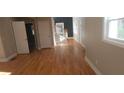 Spacious living room featuring hardwood floors, natural light, and neutral paint colors at 2085 Dellwood, Decatur, GA 30032