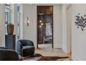 Inviting sitting room with decorative vases, lighting, and plush seating area at 1301 Peachtree Ne St # 4L, Atlanta, GA 30309