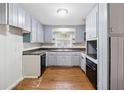 Efficient kitchen featuring ample cabinet space, durable countertops, and modern appliances at 1913 Ferry Dr, Marietta, GA 30066