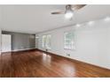 Inviting living room featuring hardwood floors and bright windows filling the space with natural light at 1913 Ferry Dr, Marietta, GA 30066
