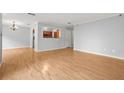 Spacious living room featuring hardwood floors and an open floor plan at 305 Mill Pond Se Ct, Smyrna, GA 30082