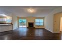 Spacious living room featuring a fireplace and sliding glass doors to the deck at 3646 Salem Dr, Lithonia, GA 30038