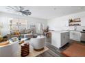 Open-concept living space with island, stainless appliances, and modern furnishings at 3554 Bluebird Ct, Atlanta, GA 30331