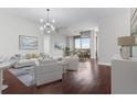 Cozy living room with natural light, modern furnishings, and scenic views from the balcony at 270 17Th Nw St # 4306, Atlanta, GA 30363