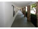 Exterior hallway with stone columns and white walls provide an inviting entryway to resident apartments at 1150 Collier Rd # K3, Atlanta, GA 30318