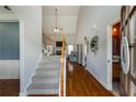Welcoming foyer with hardwood floors and a staircase leading to the upper level at 168 Gatlin Ridge Run, Dallas, GA 30157