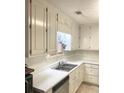 Bright kitchen with sleek countertops and plenty of cabinet space at 3041 Regal Dr, Mcdonough, GA 30253